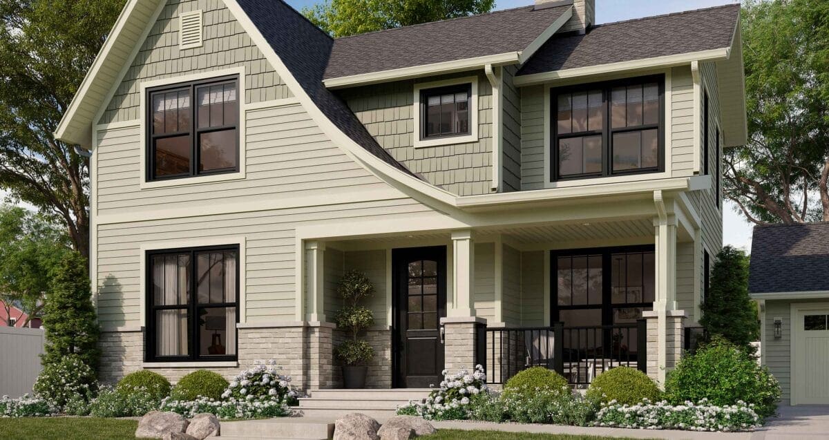 Beautiful modern two-story house with green siding and large windows.